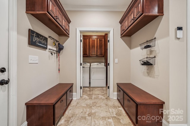 mudroom with washer and dryer