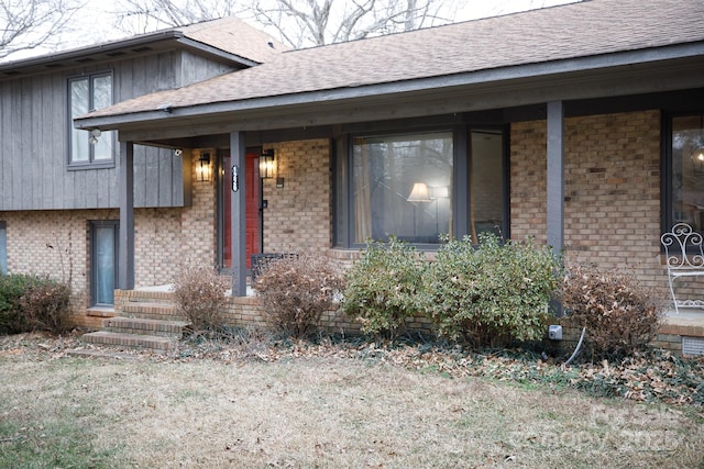 property entrance featuring covered porch