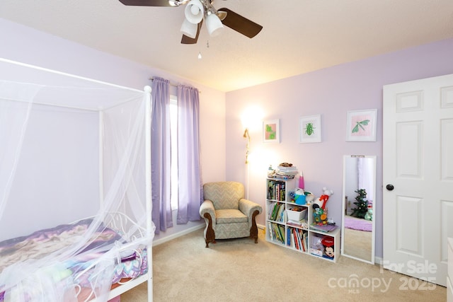 carpeted bedroom featuring ceiling fan