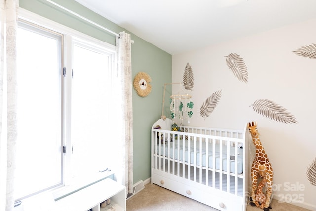 bedroom with a nursery area