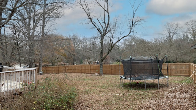 view of yard with a trampoline