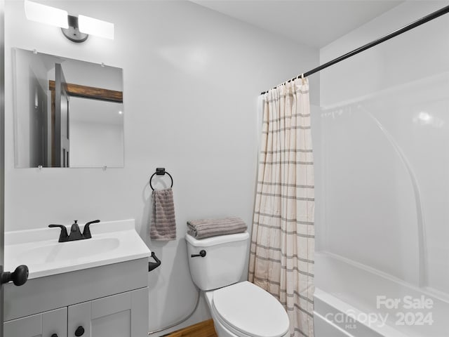 full bathroom with vanity, toilet, and shower / bathtub combination with curtain