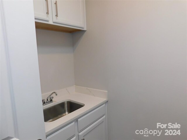 laundry room with sink