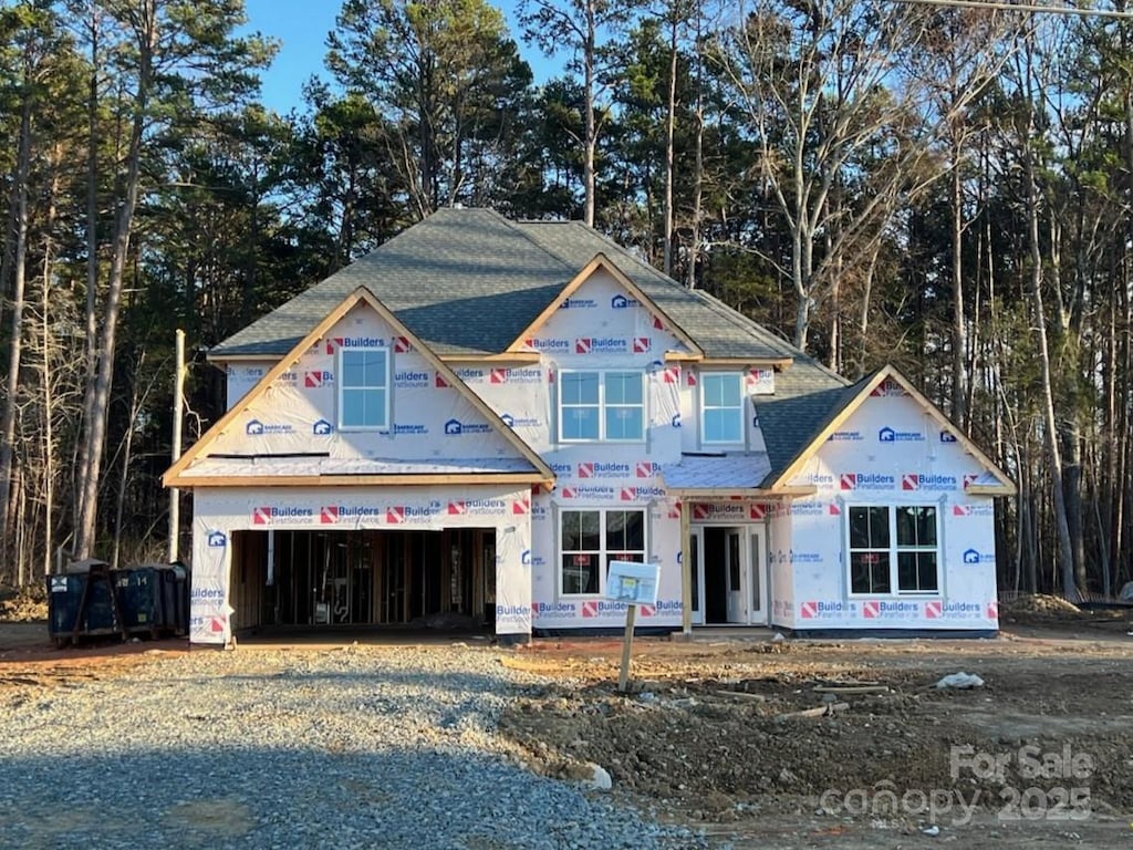 property under construction featuring a garage