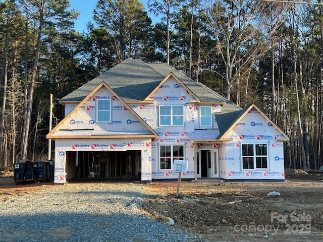 property under construction featuring a garage