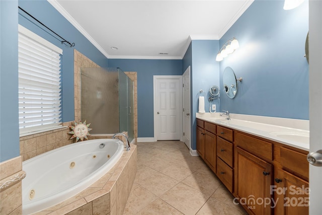 bathroom with shower with separate bathtub, vanity, tile patterned floors, and plenty of natural light