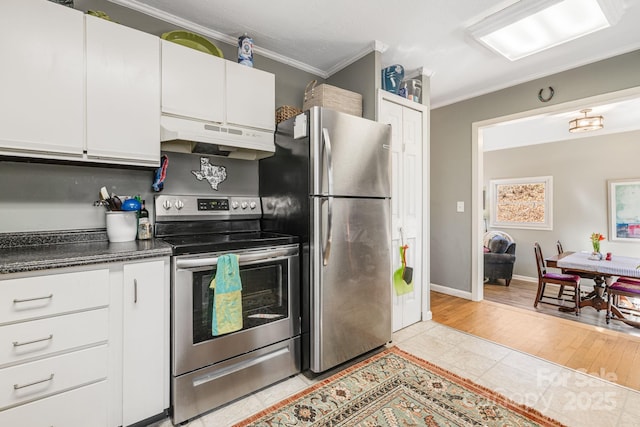 kitchen featuring appliances with stainless steel finishes, light hardwood / wood-style flooring, white cabinets, and crown molding