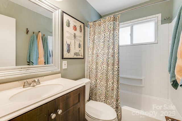 full bathroom with shower / bath combination with curtain, vanity, and toilet