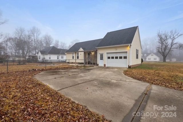 view of front of property featuring a garage