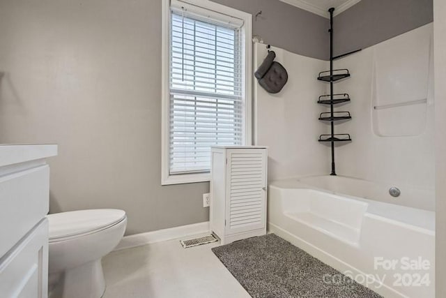 bathroom featuring shower / bathing tub combination, toilet, crown molding, and a wealth of natural light