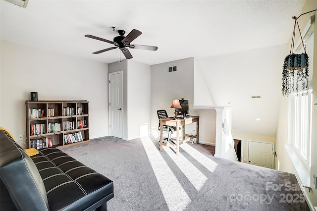 sitting room featuring ceiling fan and carpet