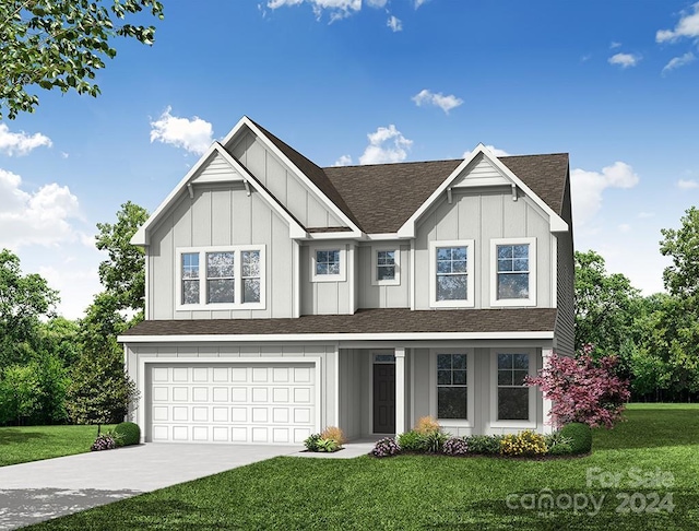 view of front facade featuring a front lawn and a garage