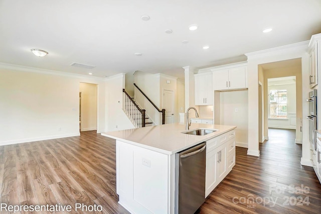 kitchen featuring white cabinets, crown molding, sink, a center island with sink, and dishwasher