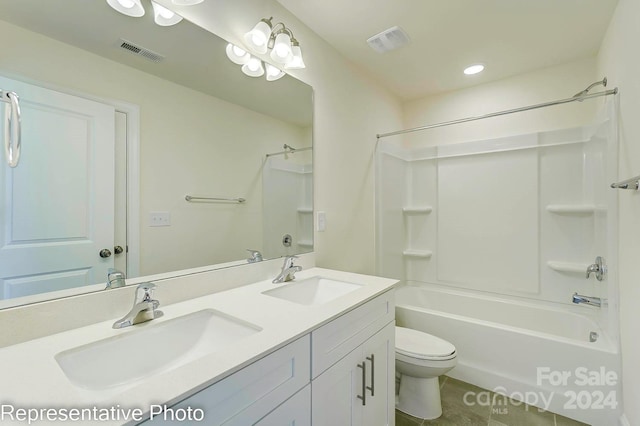 full bathroom featuring vanity, toilet, and tub / shower combination