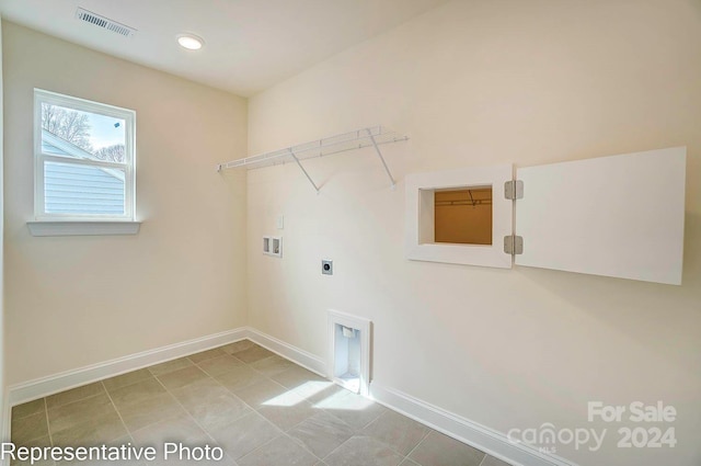 laundry area featuring hookup for an electric dryer and washer hookup