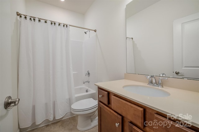 bathroom featuring vanity, tile patterned floors, toilet, and shower / tub combo with curtain