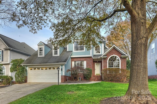 front facade featuring a front lawn and a garage