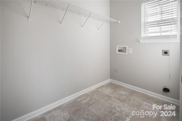 laundry area with hookup for a washing machine and hookup for an electric dryer