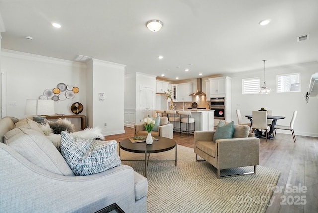 5230 Verona Rd Unit 80, Charlotte, NC 28213 - living room with ornamental molding, recessed lighting, light wood finished floors, and baseboards