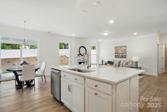 5230 Verona Rd Unit 80, Charlotte, NC 28213 - kitchen with a sink, dishwasher, crown molding, light countertops, and pendant lighting