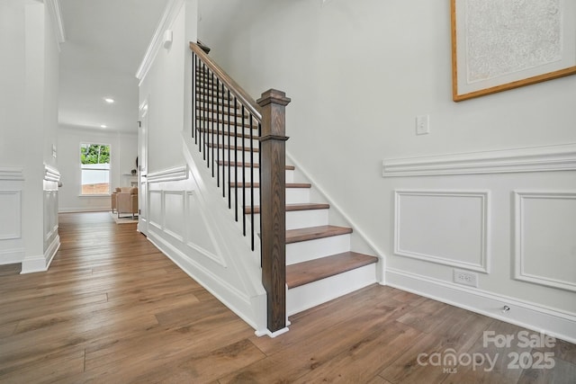 5230 Verona Rd Unit 80, Charlotte, NC 28213 - stairs featuring wood finished floors, recessed lighting, a decorative wall, and baseboards