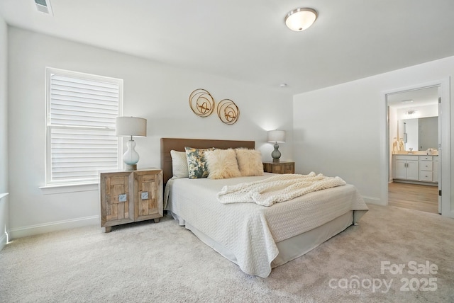 5230 Verona Rd Unit 80, Charlotte, NC 28213 - bedroom with baseboards, carpet flooring, and ensuite bathroom