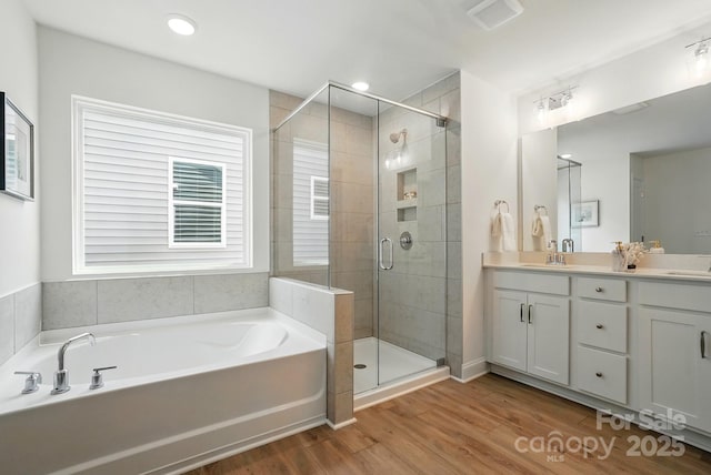 5230 Verona Rd Unit 80, Charlotte, NC 28213 - full bath with a garden tub, a stall shower, and wood finished floors