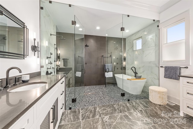 bathroom featuring vanity and plus walk in shower