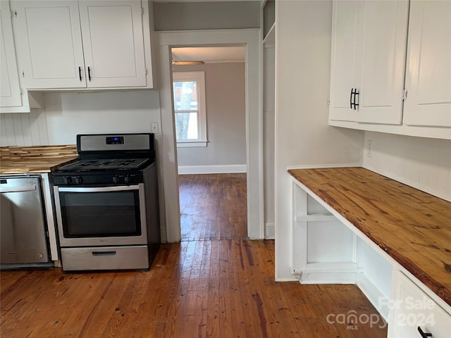 kitchen featuring white cabinetry, stainless steel range with gas cooktop, dark wood-type flooring, and wooden counters