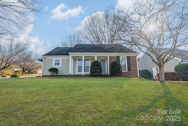 ranch-style home with a front yard