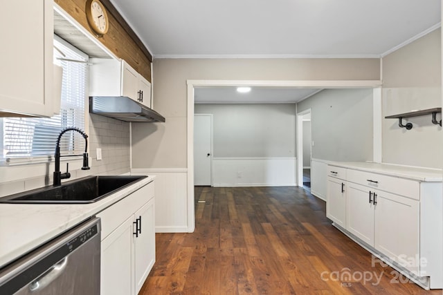 kitchen with stainless steel dishwasher, white cabinets, dark wood-style flooring, and a sink