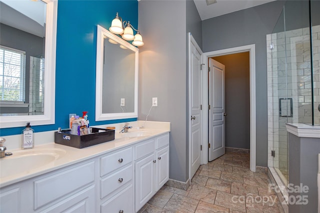 bathroom featuring vanity and walk in shower