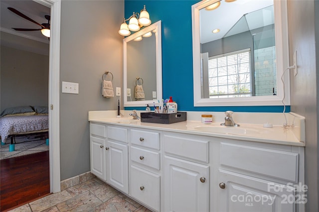 bathroom featuring vanity and ceiling fan