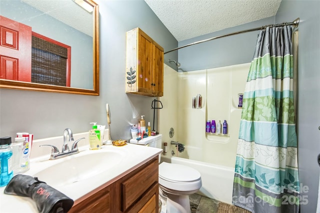 full bathroom with vanity, a textured ceiling, shower / tub combo with curtain, and toilet