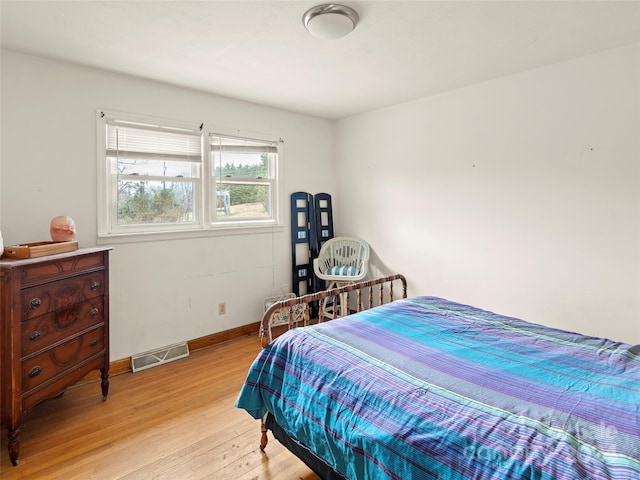 bedroom featuring light wood-type flooring