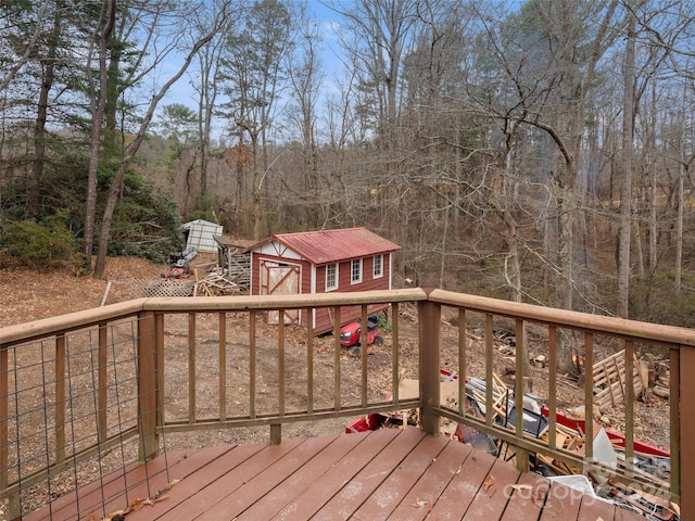 wooden terrace with a storage unit