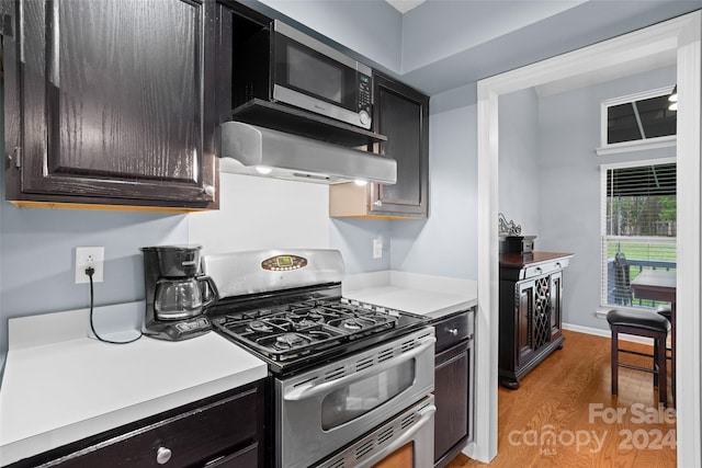 kitchen featuring hardwood / wood-style floors and stainless steel appliances