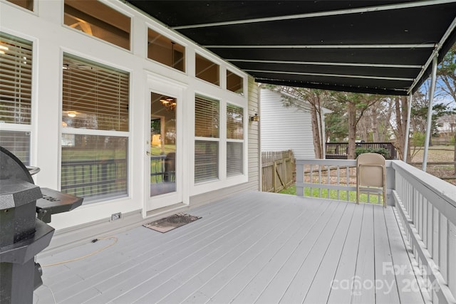 wooden deck with area for grilling