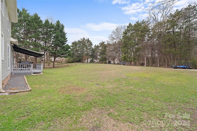 view of yard with a deck