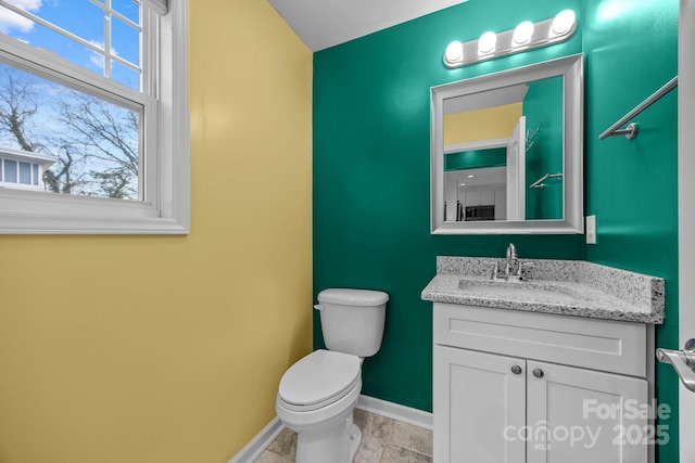 113 Burton St, Asheville, NC 28806 - bathroom with baseboards, vanity, and toilet