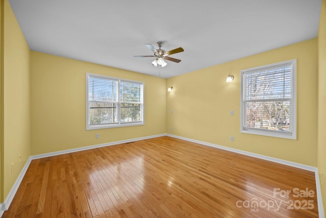 113 Burton St, Asheville, NC 28806 - spare room featuring light wood-style flooring, baseboards, and ceiling fan