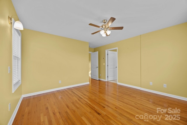 113 Burton St, Asheville, NC 28806 - spare room featuring ceiling fan, baseboards, and wood finished floors