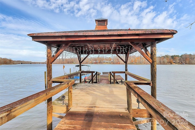 dock area with a water view