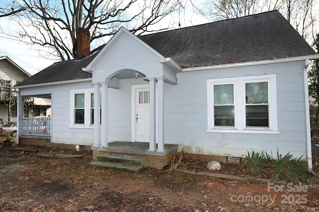 view of front of property featuring covered porch