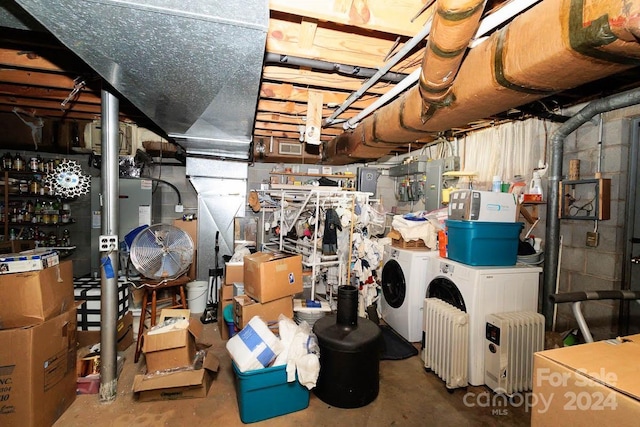 basement with washing machine and dryer