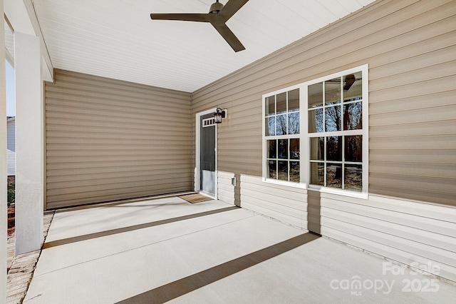 exterior space with a porch and ceiling fan