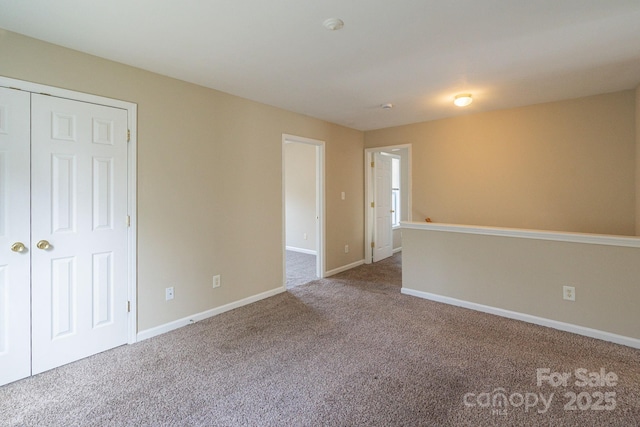 view of carpeted spare room