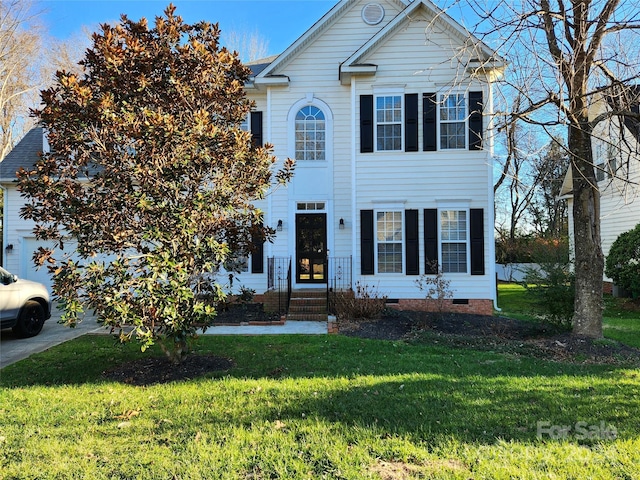 view of front of property with a front lawn