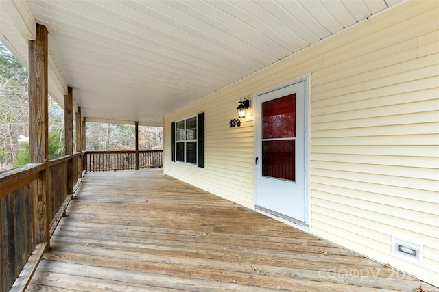 wooden deck with a porch