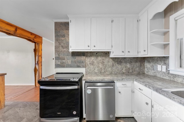 kitchen with stainless steel electric range, white cabinetry, and light wood-type flooring